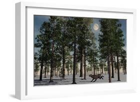 A Lone Sabre-Tooth Tiger Running Through a Snow Covered Forest-null-Framed Art Print