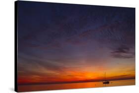 A Lone Sailboat Sits on the Calm Waters of the Chesapeake Bay Off Tilghman Island, Maryland-Karine Aigner-Stretched Canvas