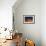 A Lone Sailboat Sits on the Calm Waters of the Chesapeake Bay Off Tilghman Island, Maryland-Karine Aigner-Framed Photographic Print displayed on a wall