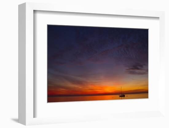 A Lone Sailboat Sits on the Calm Waters of the Chesapeake Bay Off Tilghman Island, Maryland-Karine Aigner-Framed Photographic Print