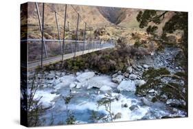 A Long Suspension Bridge over a River on the Fox Glacier Track, Wanaka, South Island, New Zealand-Paul Dymond-Stretched Canvas