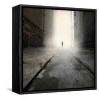 A Low Level View of a Boy Running Along the Street-Luis Beltran-Framed Stretched Canvas