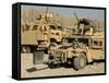 A M1114 Humvee Sits Parked in Front of a MaxxPro MRAP-Stocktrek Images-Framed Stretched Canvas