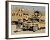 A M1114 Humvee Sits Parked in Front of a MaxxPro MRAP-Stocktrek Images-Framed Photographic Print