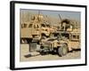 A M1114 Humvee Sits Parked in Front of a MaxxPro MRAP-Stocktrek Images-Framed Photographic Print