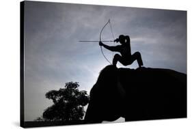 A Mahout Demonstrates His Archery Skills During a Regular Training Exercise with His Elephant-Sukree Sukplang-Stretched Canvas