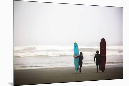 A Male And Female Surfer Hold Their Surfboards In The Olympic National Park In Washington State-Ben Herndon-Mounted Photographic Print