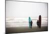 A Male And Female Surfer Hold Their Surfboards In The Olympic National Park In Washington State-Ben Herndon-Mounted Photographic Print