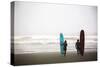 A Male And Female Surfer Hold Their Surfboards In The Olympic National Park In Washington State-Ben Herndon-Stretched Canvas