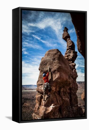 A Male Climber on the Third Pitch of Classic Tower Climb Ancient Art, Fisher Towers, Moab, Utah-Dan Holz-Framed Stretched Canvas