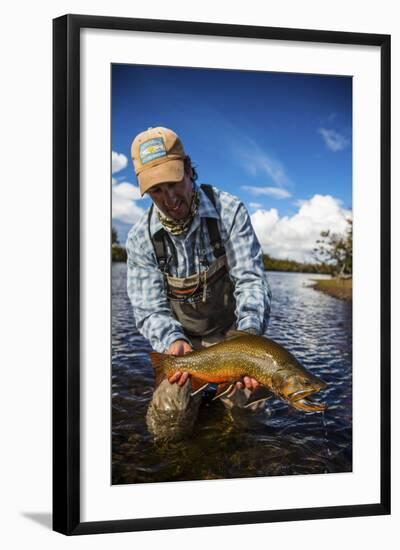 A Male Fly Fishing Guide Holds a Beautiful Male Brook Trout-Matt Jones-Framed Photographic Print