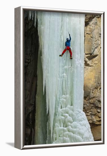 A Male Ice Climber Climbing the 6th Pitch of Broken Hearts, (Wi5), Cody Wyoming-Daniel Gambino-Framed Photographic Print