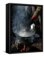 A Man, 24, from Ghana, Prepares His Meal-null-Framed Stretched Canvas