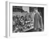 A Man Browsing in a Butcher Shop-null-Framed Photographic Print