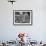 A Man Browsing in a Butcher Shop-null-Framed Photographic Print displayed on a wall