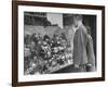 A Man Browsing in a Butcher Shop-null-Framed Photographic Print