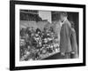 A Man Browsing in a Butcher Shop-null-Framed Photographic Print