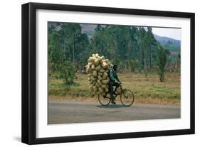 A Man Carrying Goods by Bike, Uganda-null-Framed Giclee Print