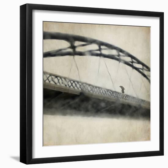 A Man Crossing a Bridge on a Raining Day-Trigger Image-Framed Photographic Print