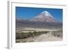 A Man Cycles in the Shadow of Sajama Volcano in Sajama National Park-Alex Saberi-Framed Photographic Print