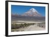 A Man Cycles in the Shadow of Sajama Volcano in Sajama National Park-Alex Saberi-Framed Photographic Print