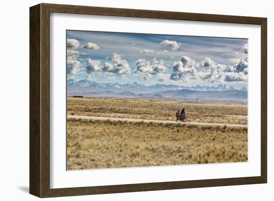 A Man Cycles with a Family Member on the Back of His Bicycle Between La Paz and Tiwanaku-Alex Saberi-Framed Photographic Print