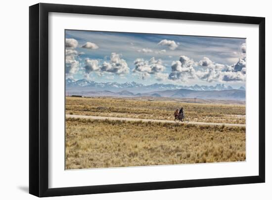 A Man Cycles with a Family Member on the Back of His Bicycle Between La Paz and Tiwanaku-Alex Saberi-Framed Photographic Print