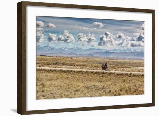 A Man Cycles with a Family Member on the Back of His Bicycle Between La Paz and Tiwanaku-Alex Saberi-Framed Photographic Print