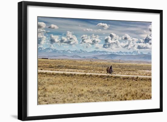 A Man Cycles with a Family Member on the Back of His Bicycle Between La Paz and Tiwanaku-Alex Saberi-Framed Photographic Print