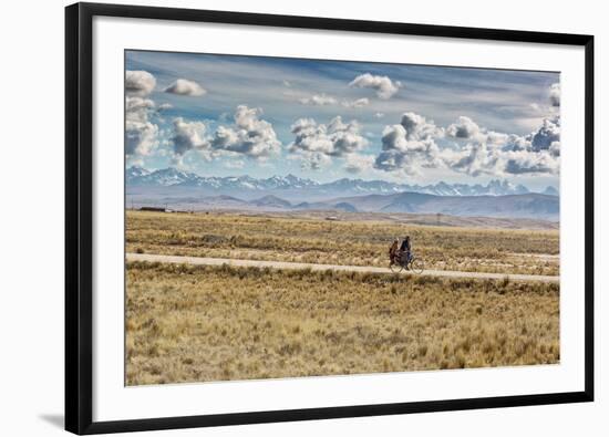 A Man Cycles with a Family Member on the Back of His Bicycle Between La Paz and Tiwanaku-Alex Saberi-Framed Photographic Print