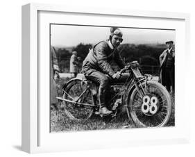 A Man Dressed in Leathers on a Harley-Davidson-null-Framed Photographic Print