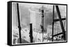 A Man Hangs Precariously from a Line During the Construction of a Skyscraper in New York-null-Framed Stretched Canvas