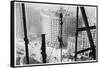 A Man Hangs Precariously from a Line During the Construction of a Skyscraper in New York-null-Framed Stretched Canvas