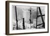 A Man Hangs Precariously from a Line During the Construction of a Skyscraper in New York-null-Framed Photographic Print