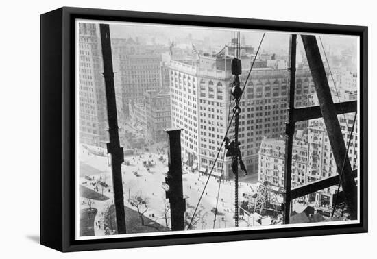 A Man Hangs Precariously from a Line During the Construction of a Skyscraper in New York-null-Framed Stretched Canvas