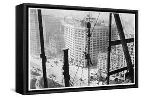 A Man Hangs Precariously from a Line During the Construction of a Skyscraper in New York-null-Framed Stretched Canvas