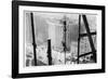 A Man Hangs Precariously from a Line During the Construction of a Skyscraper in New York-null-Framed Photographic Print