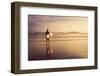 A Man is Standing with a Surf in His Hands on the Sea Shore.-Mariia Smeshkova-Framed Photographic Print