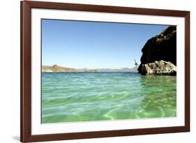 A Man Jumps into a Bay Near Loreto, Baja Sur, Mexico-Bennett Barthelemy-Framed Photographic Print