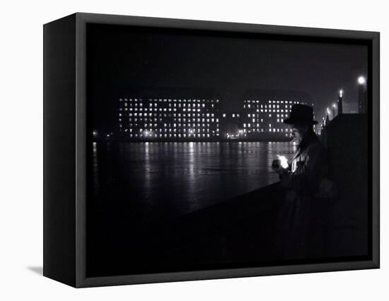 A Man Lights a Cigarette on the Thames Embankment in London, 1955-null-Framed Stretched Canvas