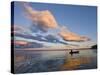 A Man Paddles a Canoe at Sunset on Lake Sebago.-Sergio Ballivian-Stretched Canvas