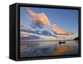 A Man Paddles a Canoe at Sunset on Lake Sebago.-Sergio Ballivian-Framed Stretched Canvas