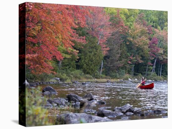 A Man Paddles His Canoe, Seboeis Lake, Millinocket, Maine, USA-Jerry & Marcy Monkman-Stretched Canvas