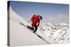 A Man Ski Drops into the Heel in the Wasatch Mountains, Utah-Louis Arevalo-Stretched Canvas