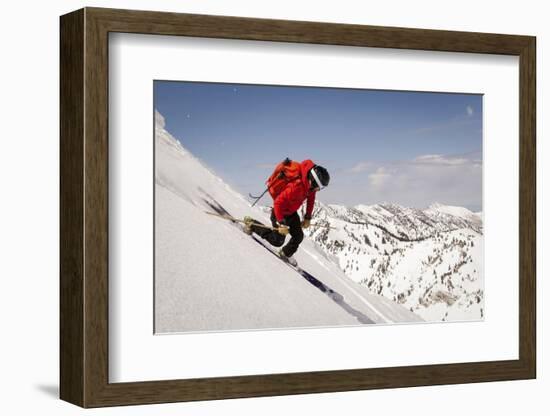 A Man Ski Drops into the Heel in the Wasatch Mountains, Utah-Louis Arevalo-Framed Photographic Print