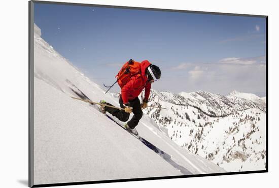 A Man Ski Drops into the Heel in the Wasatch Mountains, Utah-Louis Arevalo-Mounted Photographic Print