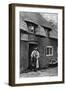 A Man Smoking a Pipe Outside a Shop, Worcestershire, C1922-AW Cutler-Framed Giclee Print