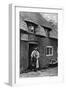 A Man Smoking a Pipe Outside a Shop, Worcestershire, C1922-AW Cutler-Framed Giclee Print