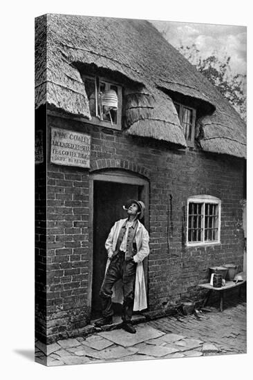 A Man Smoking a Pipe Outside a Shop, Worcestershire, C1922-AW Cutler-Stretched Canvas