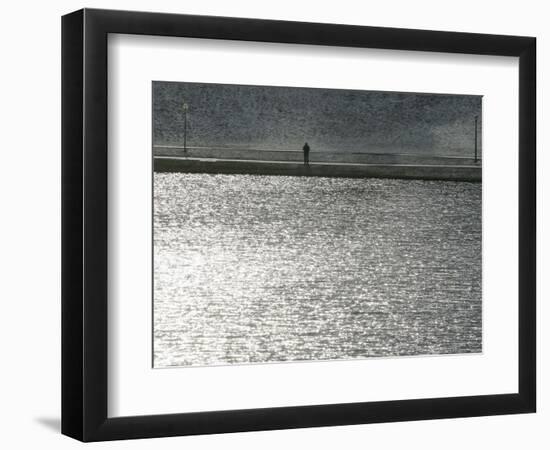 A Man Stands on the Banks of a Small Lake, Munich, on Friday, November 3, 2006.-Christof Stache-Framed Photographic Print